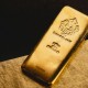 黄金支持的加密货币在股市暴跌中回落至历史高点以下